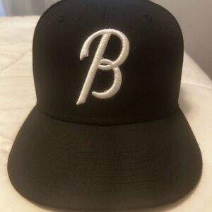 New Era Black and White Hat with Embroidered Logo